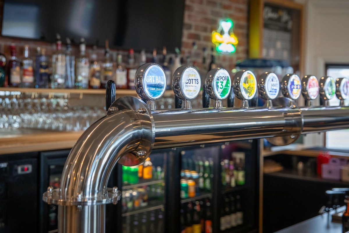Stainless steel beer taps at the Makikihi Country Hotel bar