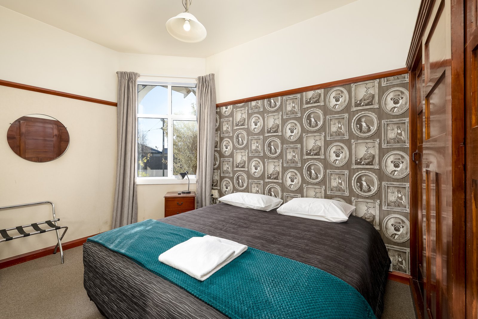 Comfortable hotel bedroom at Makikihi Country Hotel